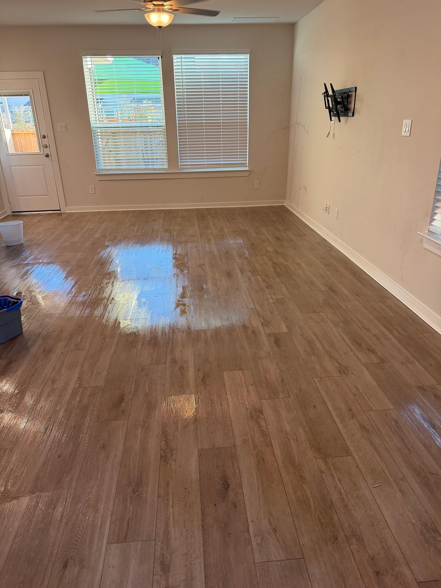 The same living room with a freshly cleaned, spotless floor after a Gen 2 clean